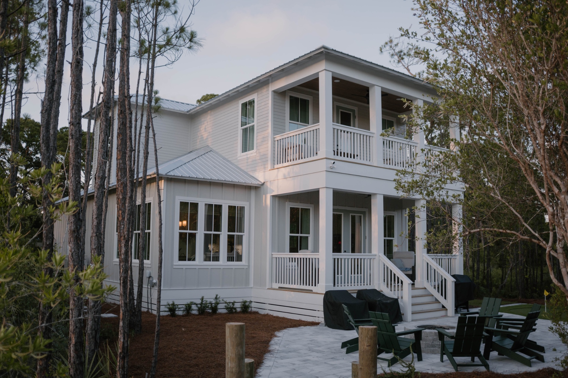 Piney Shores coastal home exterior with wraparound porches